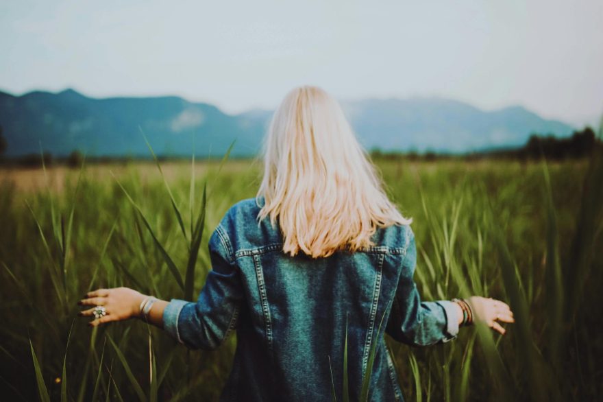 woman standing on crop field